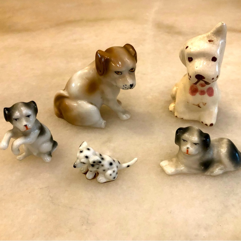 Collection of antique porcelain dogs